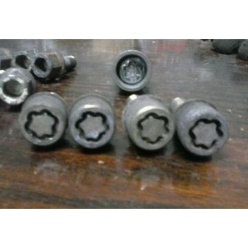 99 VwCabrio aluminun wheel lug nuts with lock lugs and tool